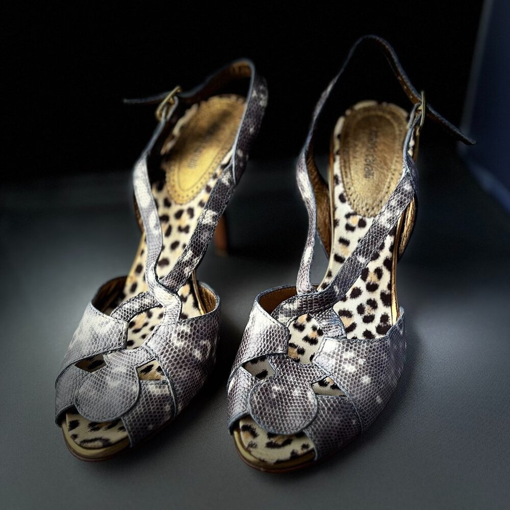 Authentic open-toed Roberto Cavalli shoe with snake-embossed leather.